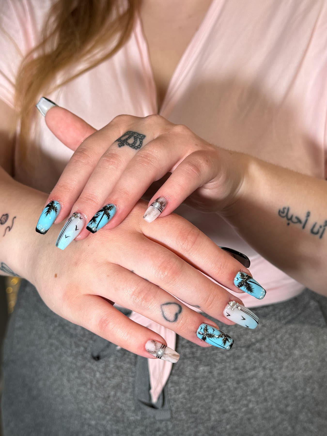 Turquoise nail art with details